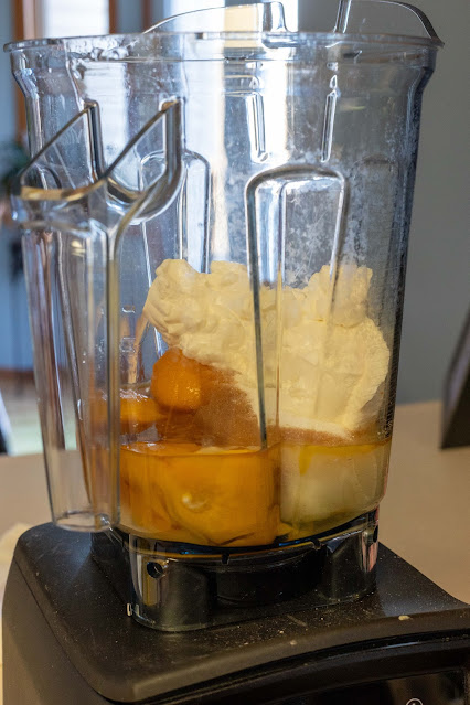 Whole boiled lemons, sour cream, sugar, and flour in the vitamin blender. 