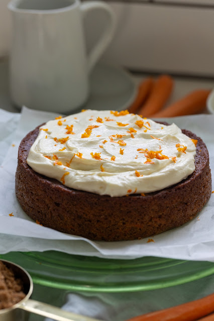 Complete unsliced carrot cake with a cream cheese frosting and grated carrot. The best carrot cake tips led to this amazing finished product.