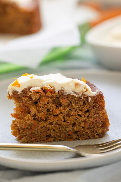 Carrot cake tips led to the best slice of carrot cake. Beautiful slice of moist cake with cream cheese frosting and grated carrot.