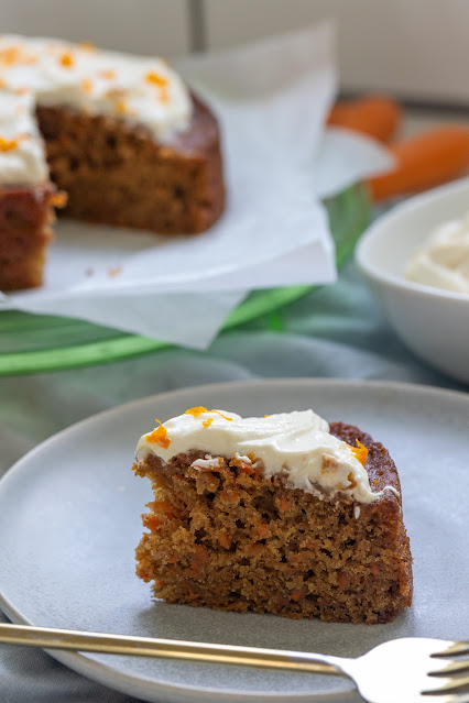 Carrot cake tips led to the best slice of carrot cake. Beautiful slice of moist cake with cream cheese frosting and grated carrot.